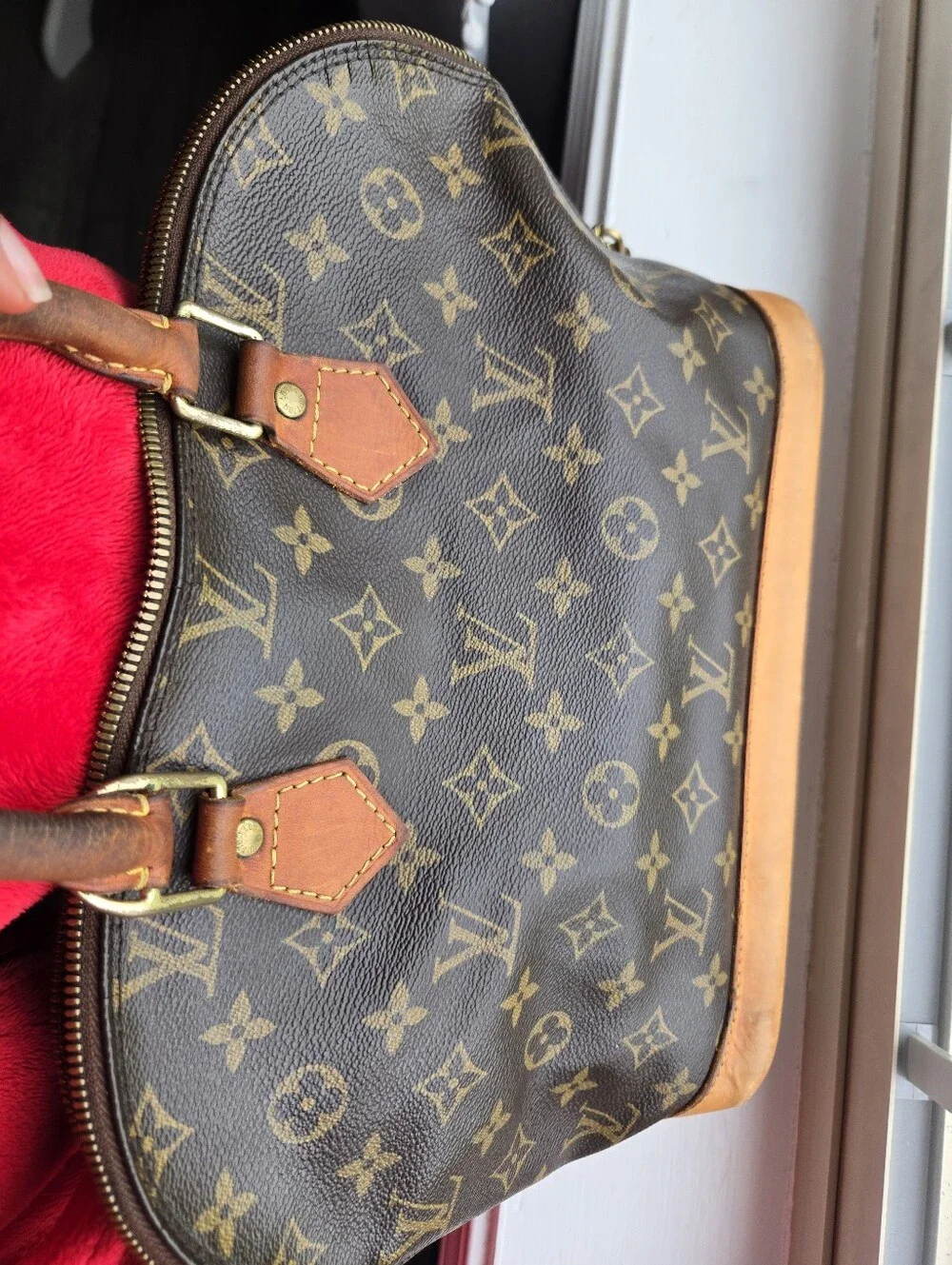 Louis Vuitton Brown Monogram Alma Handbag